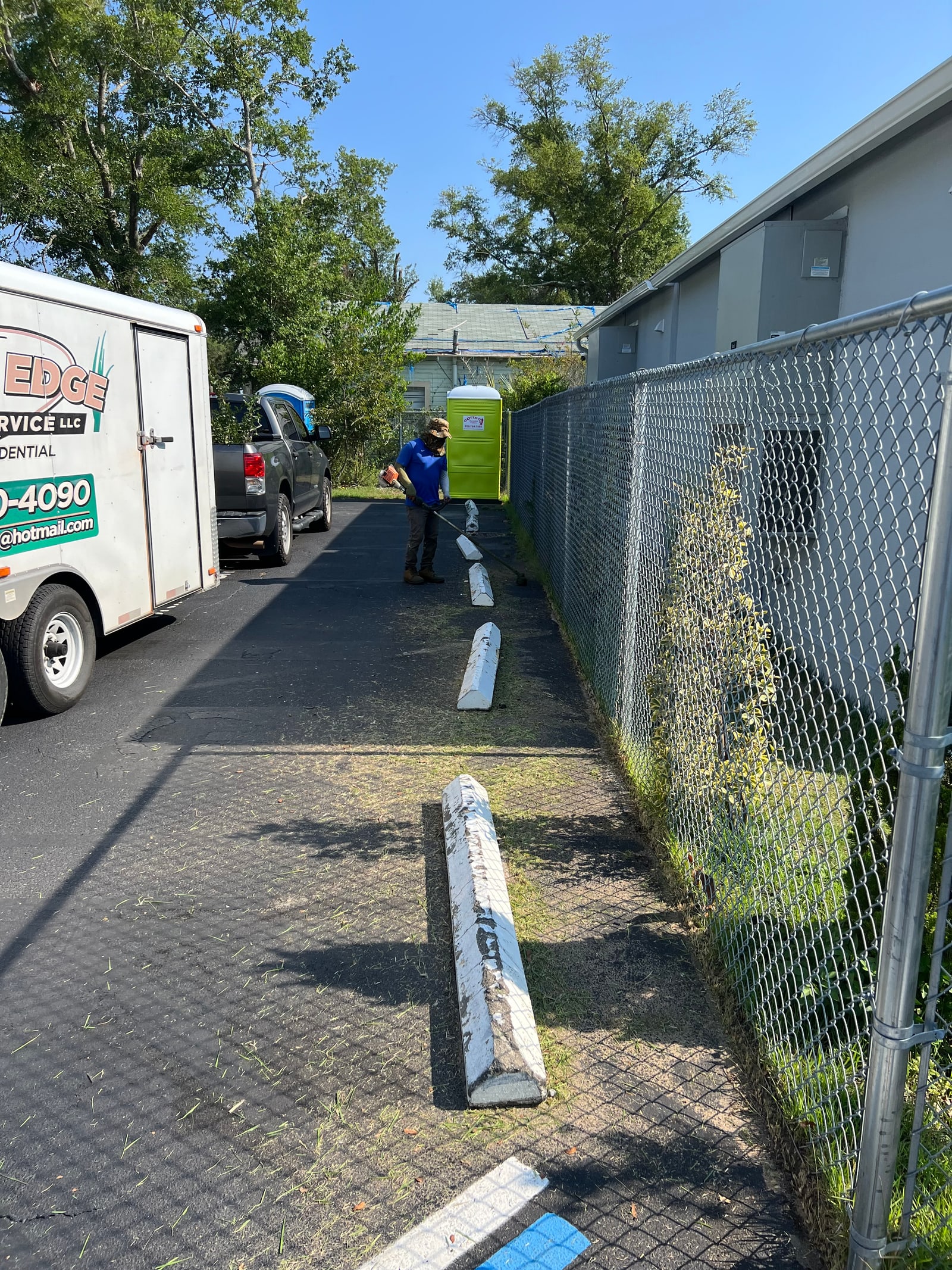 CUT-N-EDGE mowing service work on a Panama City property